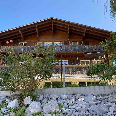 See Und Berge Garden Faulensee Exterior foto