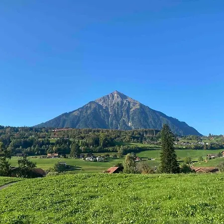See Und Berge Garden Faulensee Exterior foto